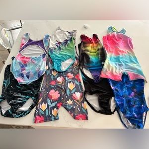 9 gymnastics leotards, sizes 8-10